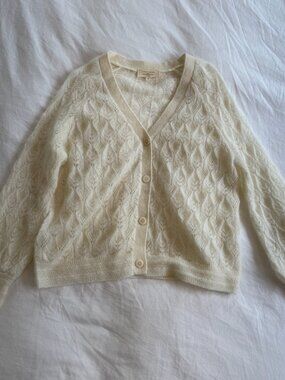 cream sezane cardigan with leaf pattern